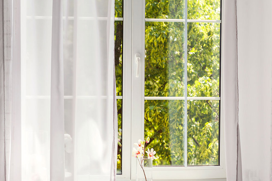 window with white curtains bedford hills ny